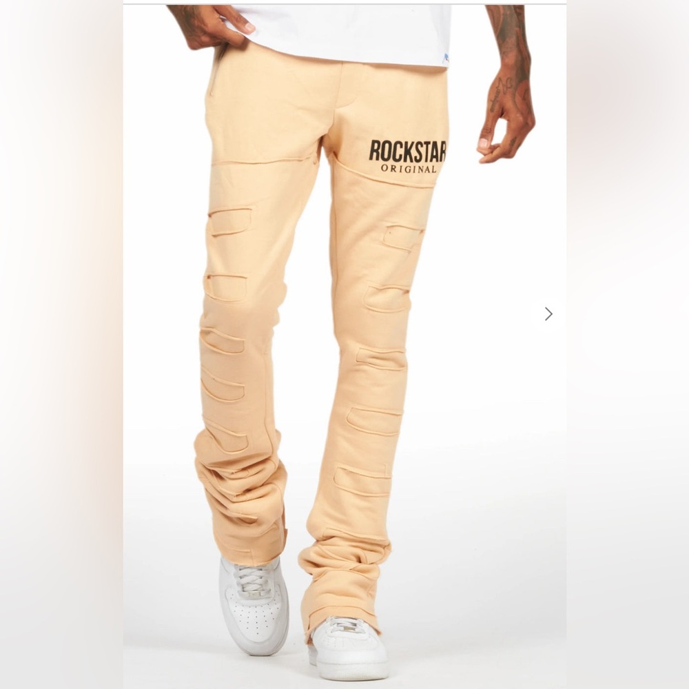 Emilio Beige Stacked Flare Track Pants
Size: XL